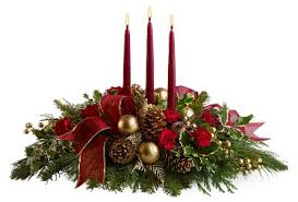 Centro de mesa navideño · velas $550