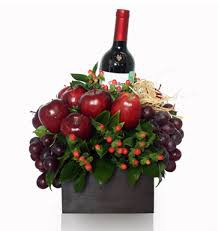 Arreglo frutas artificiales base madera $550